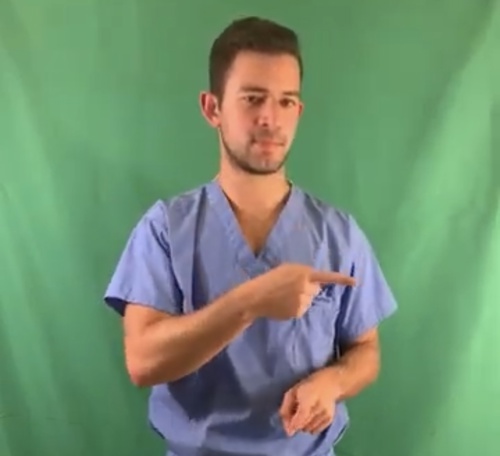 Photo of Dr. Samona creating YouTube video